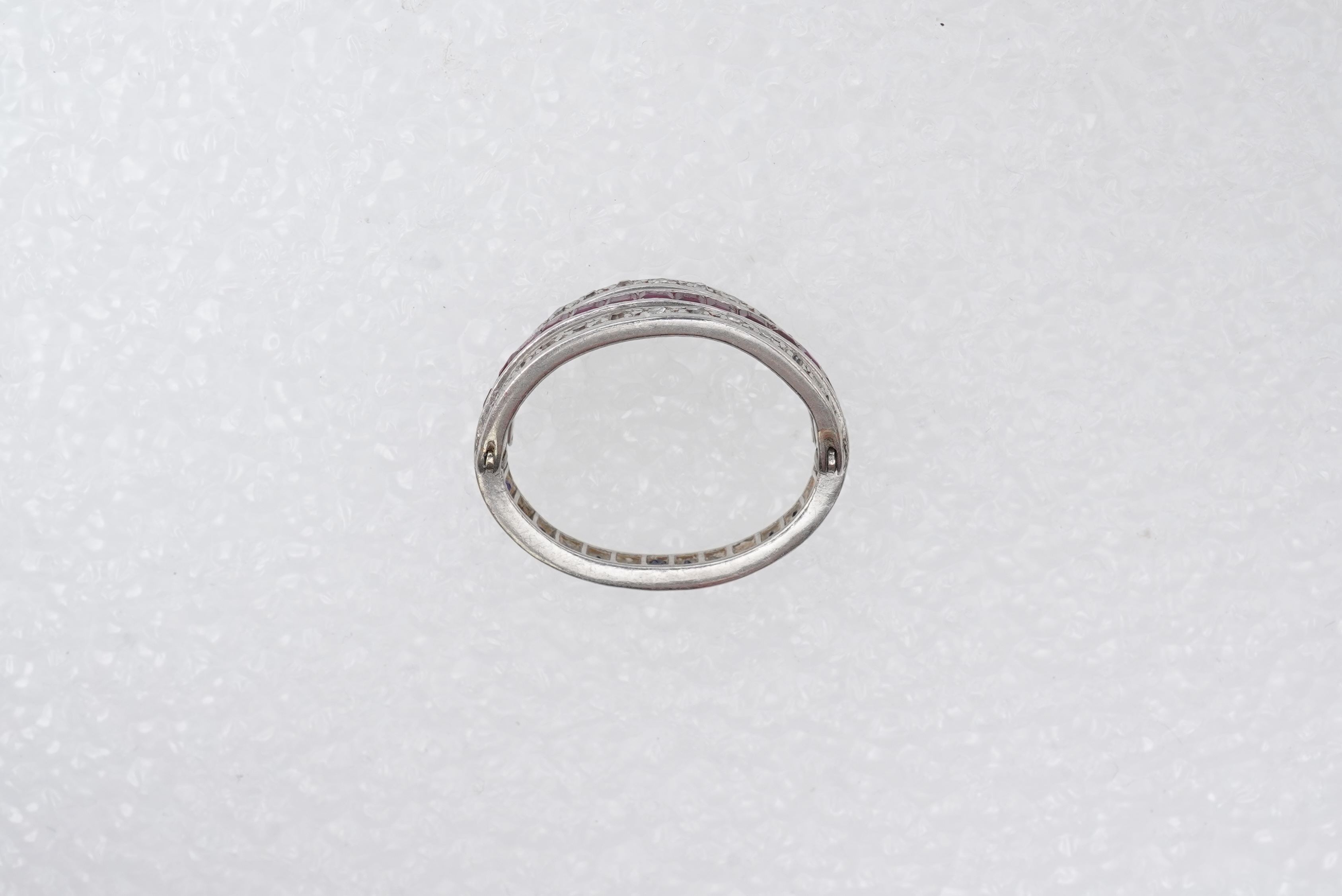 A ruby, sapphire and diamond 'Day and Night' ring, mid 20th century